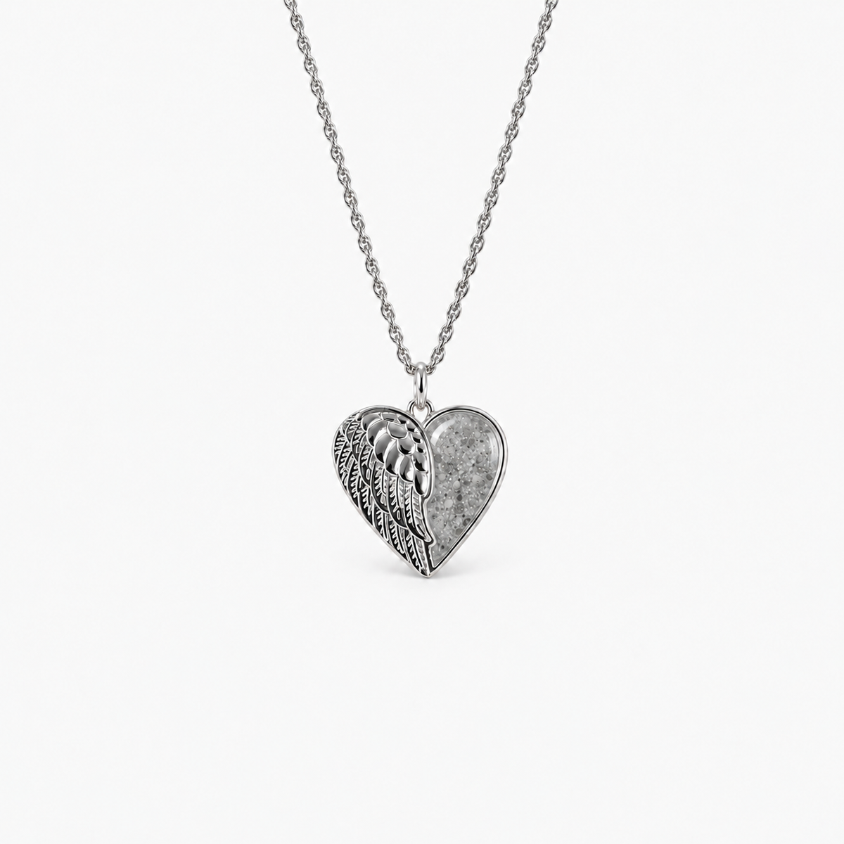 Angel Wing Heart Ashes Necklace — Silver, visible ashes