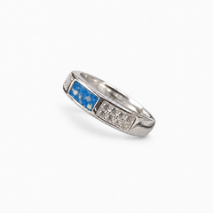 Crystal Channel Ashes Ring in Sky Blue with visible ashes