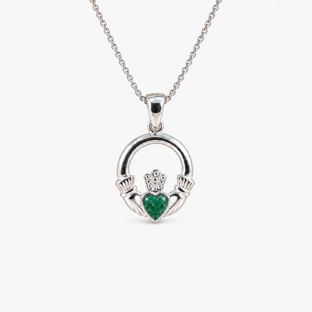 Claddagh Ashes Necklace in Emerald with visible inclusions