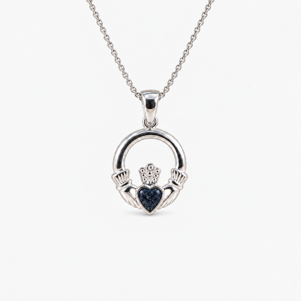 Claddagh Ashes Necklace in Midnight with visible inclusions