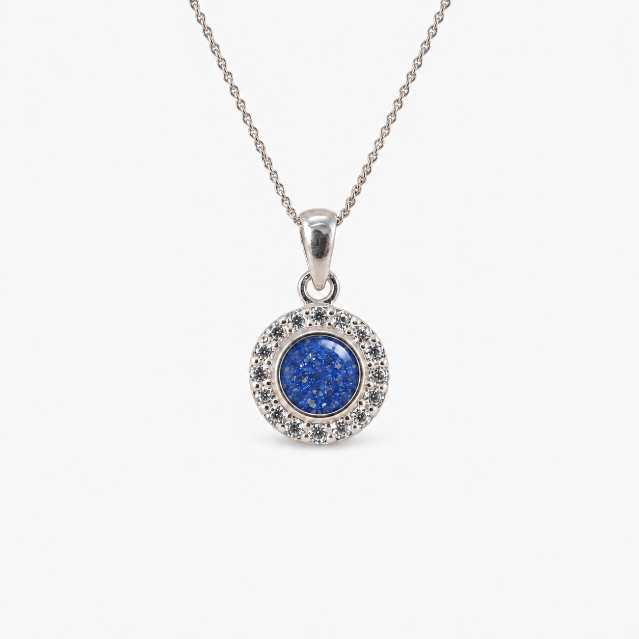 Dainty Halo Ashes Necklace in Sapphire with visible inclusions