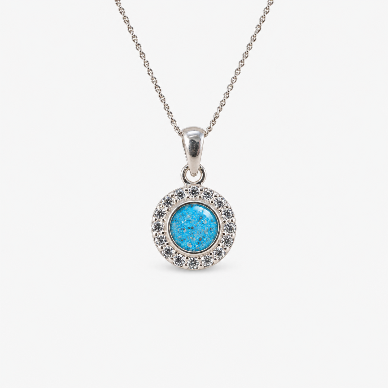 Dainty Halo Ashes Necklace in Sky Blue with visible ashes