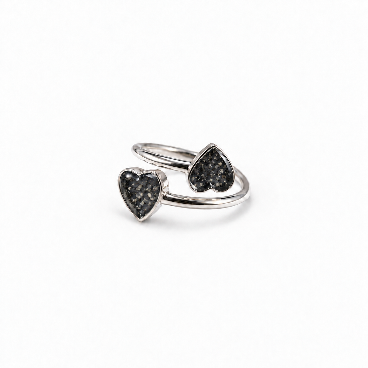 Double Heart Ashes Ring in Midnight with visible ashes