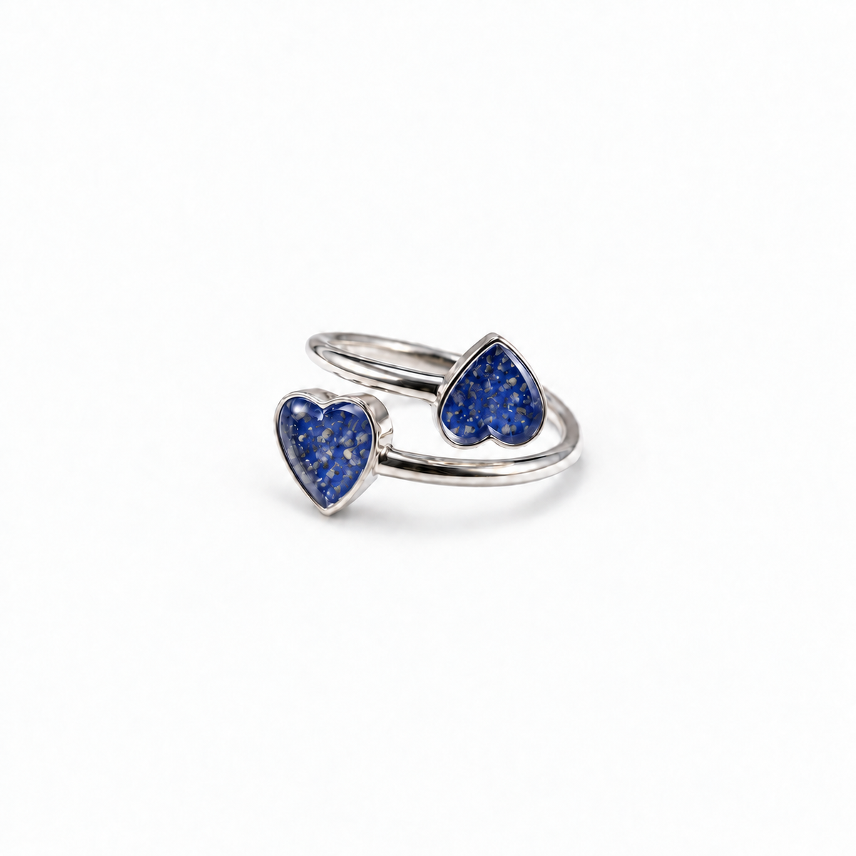 Double Heart Ashes Ring in Sapphire with visible ashes