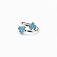 Double Heart Ashes Ring in Sky Blue with visible ashes