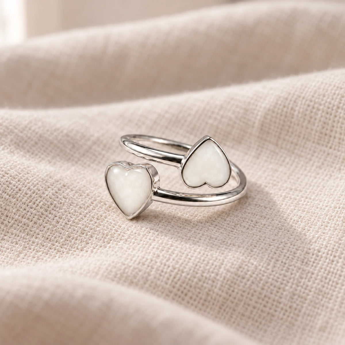 Double Heart Breast Milk Ring on pale linen — illustrative preview
