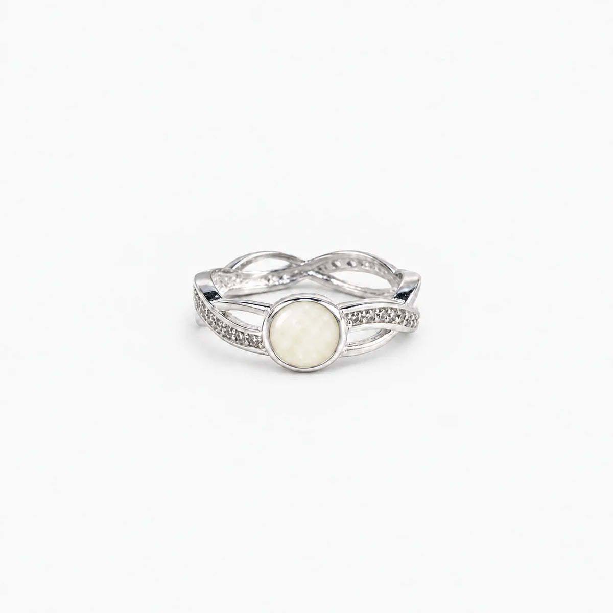 Entwined Breast Milk Ring in sterling silver with natural milk resin — illustrative preview