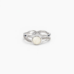 Entwined Breast Milk Ring in sterling silver with natural milk resin — illustrative preview
