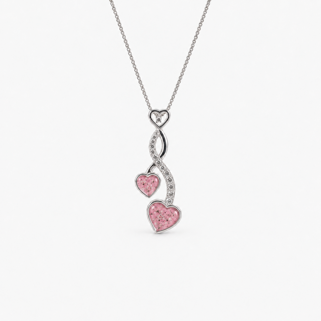 Entwined Hearts Ashes Necklace — Pink, visible ashes