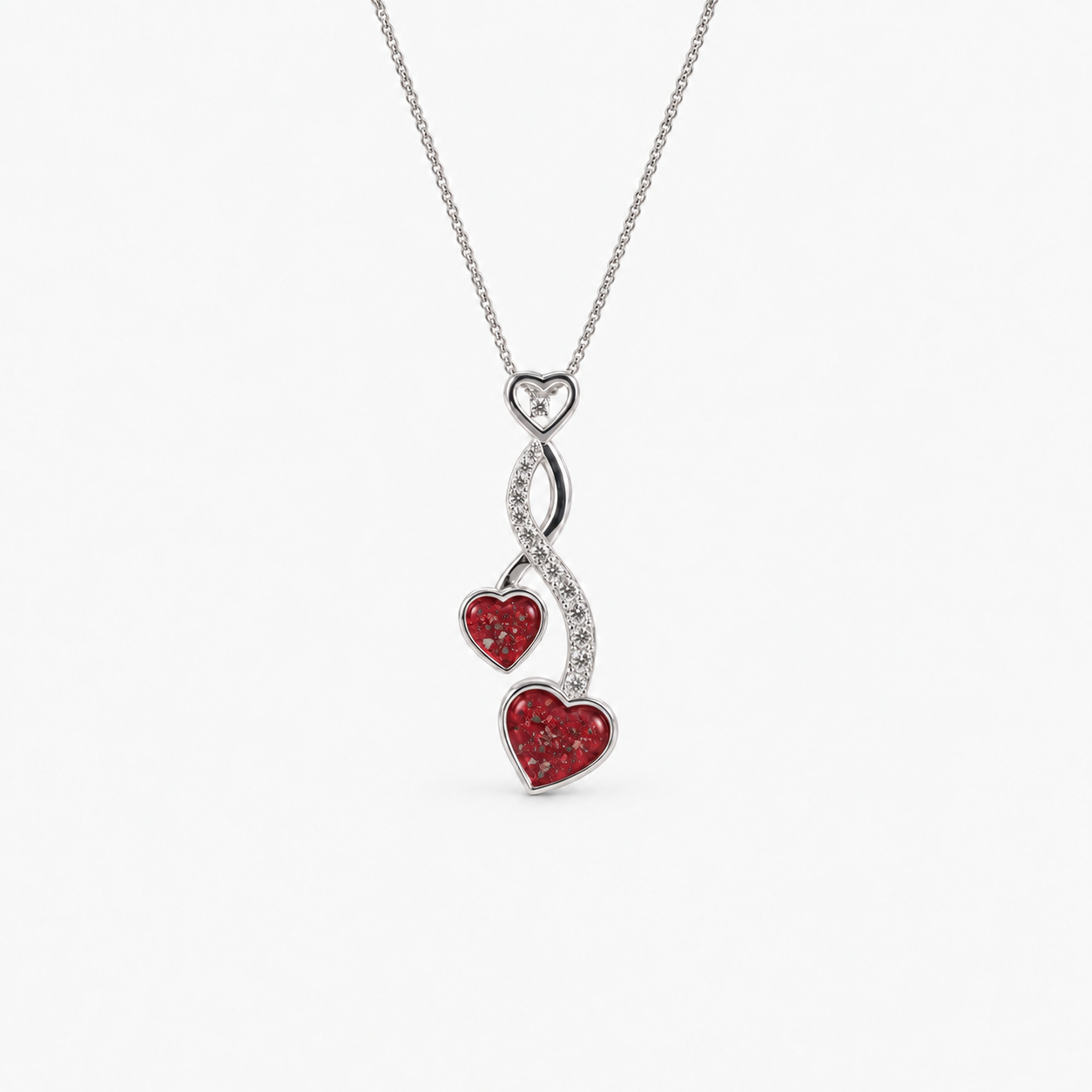 Entwined Hearts Ashes Necklace — Ruby Red, visible ashes