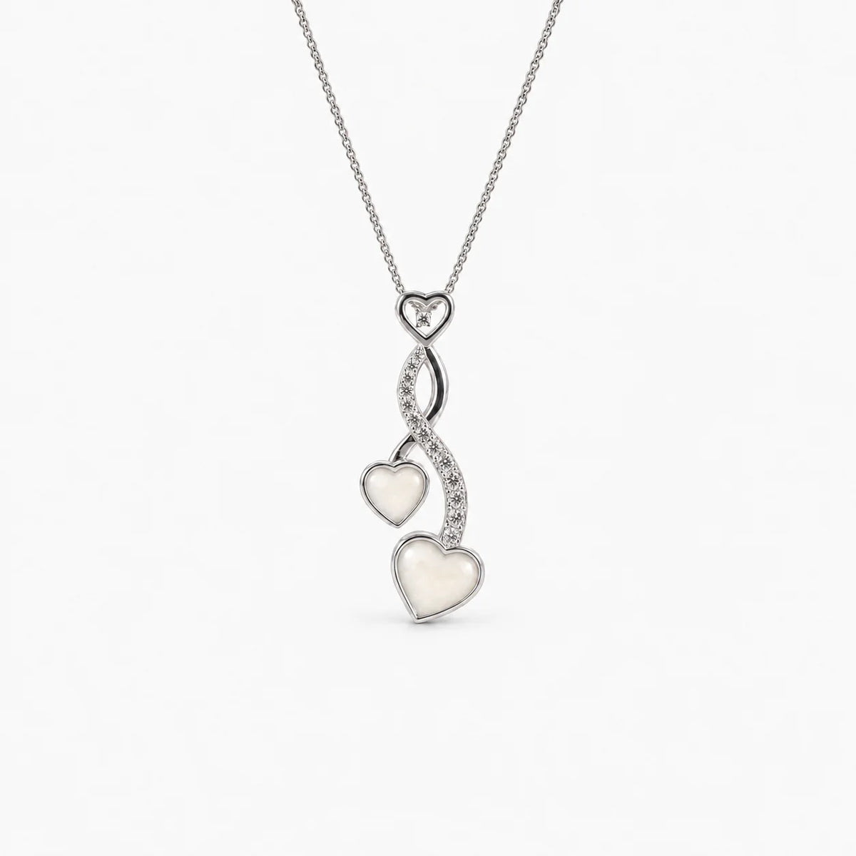 Entwined Hearts Breast Milk Necklace in sterling silver with natural milk resin — illustrative preview