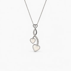 Entwined Hearts Breast Milk Necklace in sterling silver with natural milk resin — illustrative preview