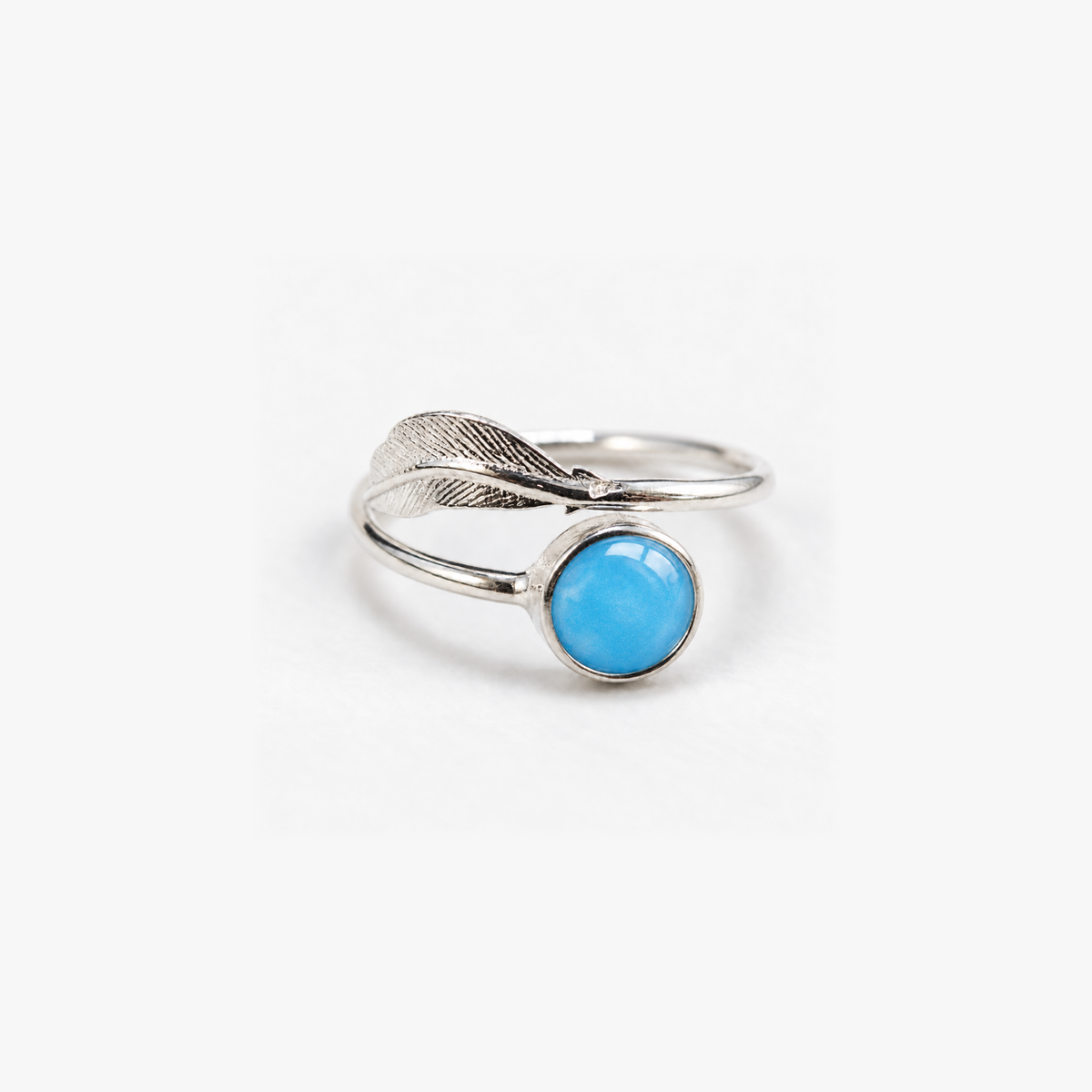 Feather Ashes Ring in sky blue with hidden inclusions
