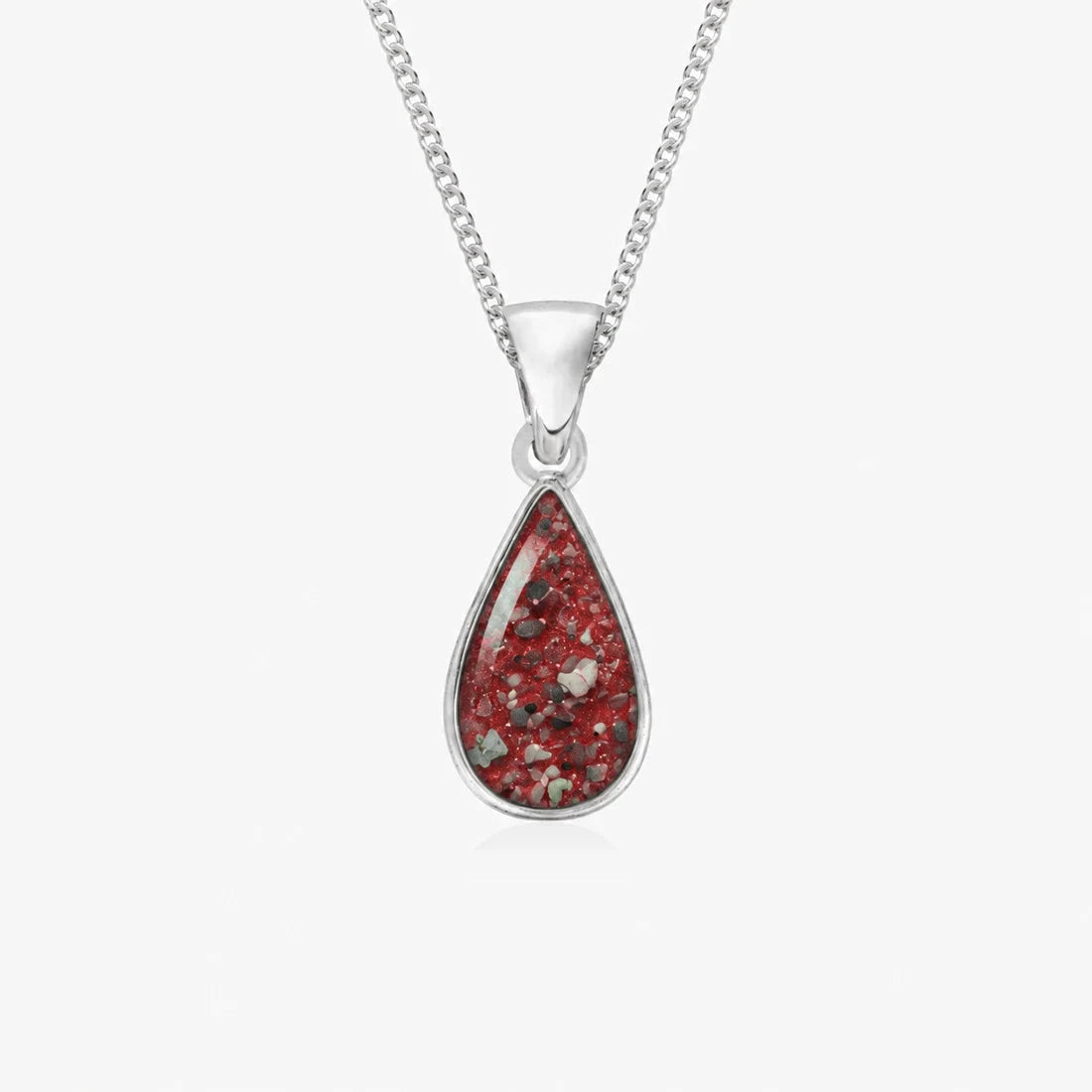 Tear Drop Ashes Necklace in Ruby Red with visible inclusions