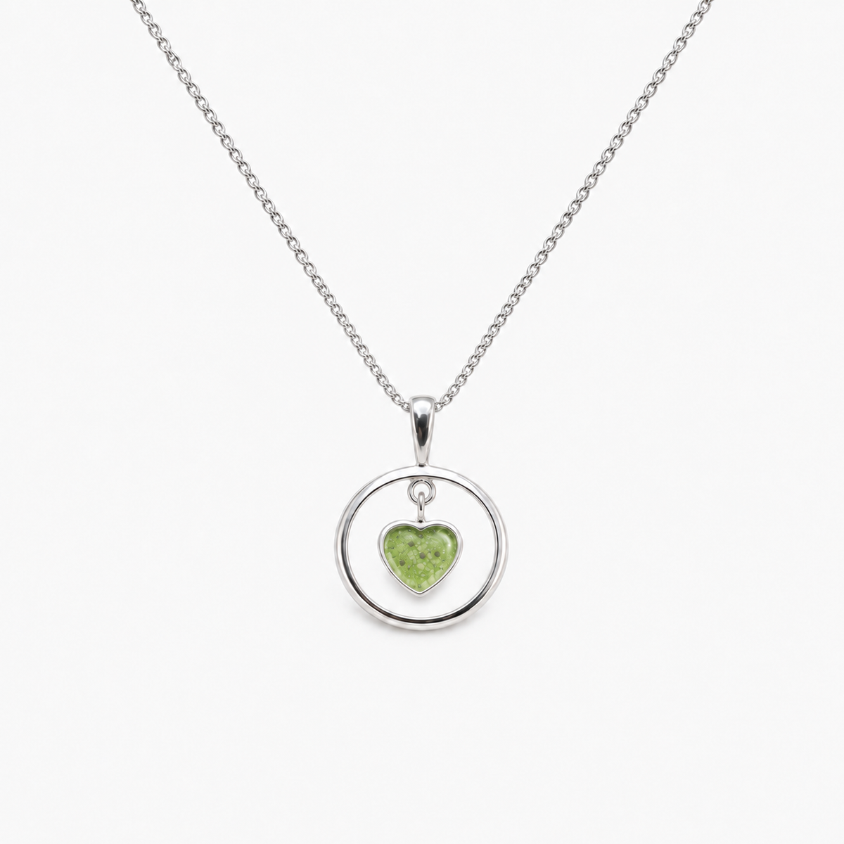 Floating Heart Ashes Necklace — Apple Green, visible ashes
