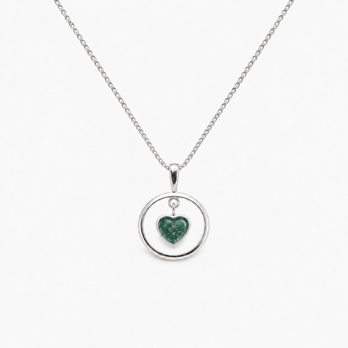 Floating Heart Ashes Necklace — Emerald, visible ashes