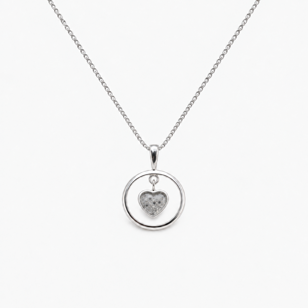 Floating Heart Ashes Necklace — Silver, visible ashes