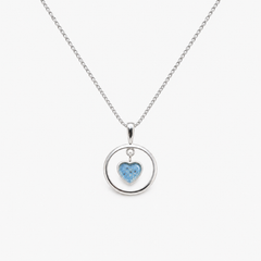 Floating Heart Ashes Necklace in Sky Blue with visible inclusions
