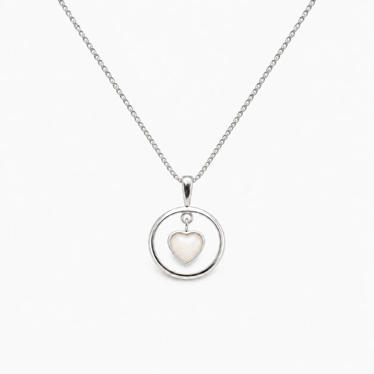Floating Heart Breast Milk Necklace in sterling silver with natural milk resin — illustrative preview