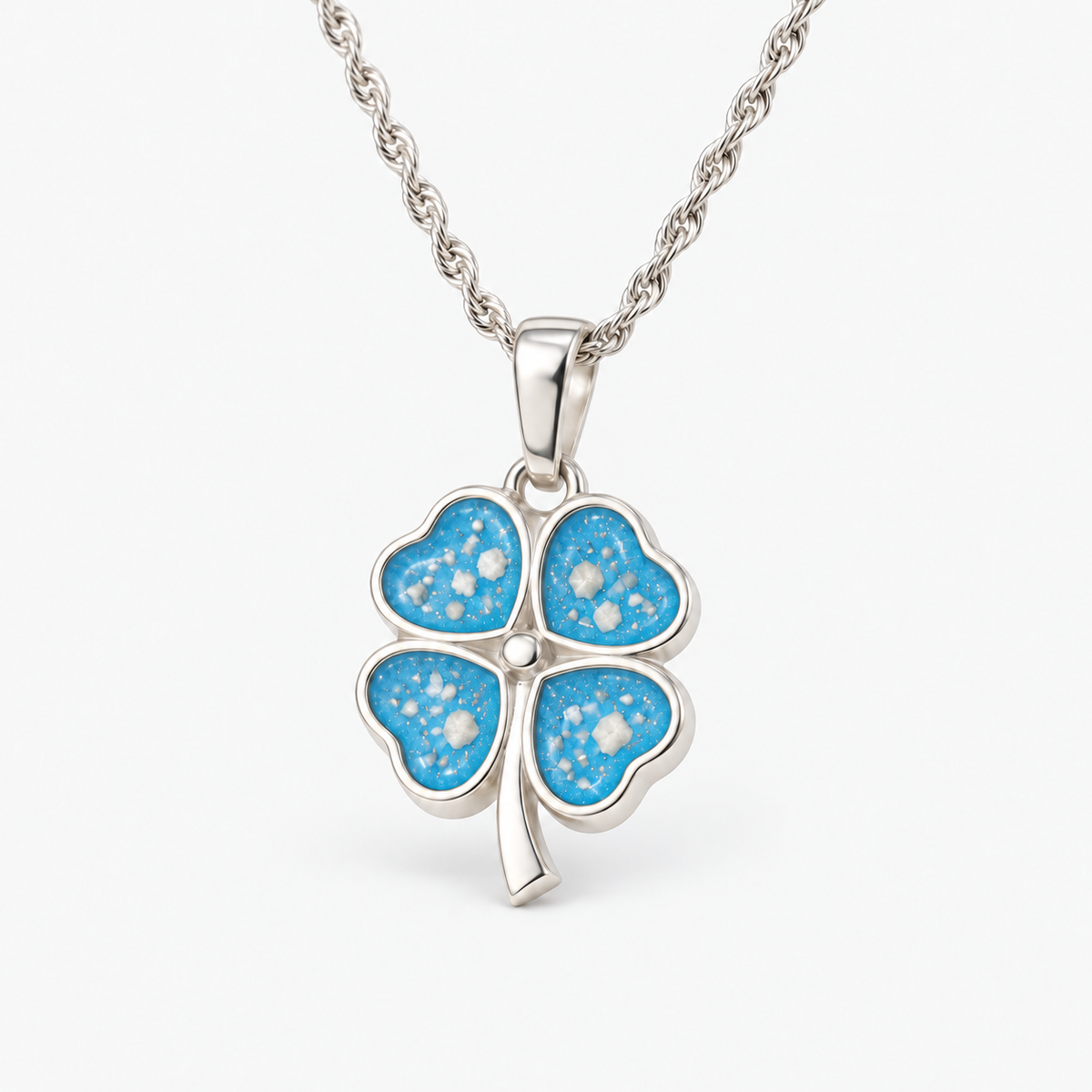 Four Leaf Clover Ashes Necklace — Sky Blue, visible ashes