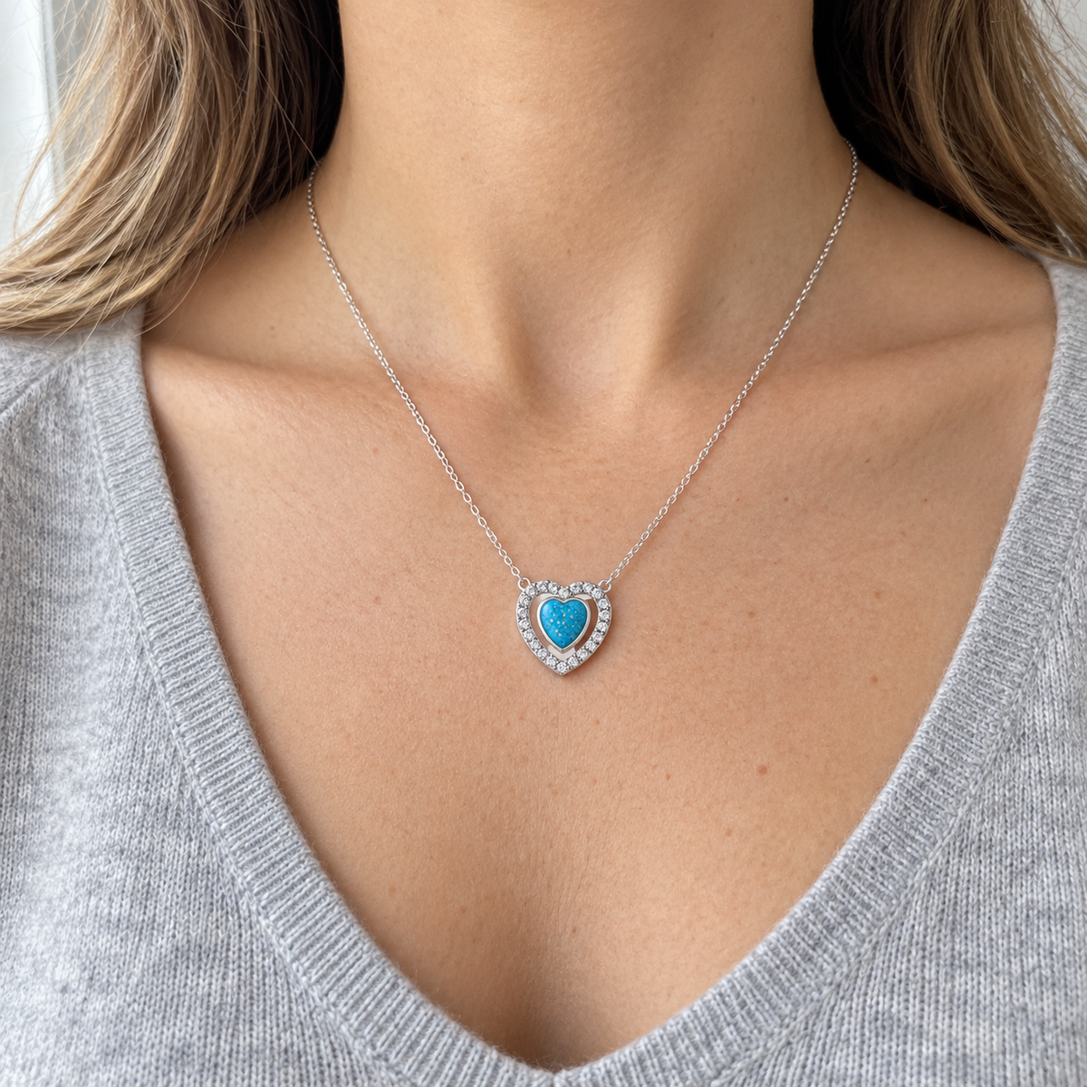 Heart Halo Ashes Necklace worn, illustrative Sky Blue finish