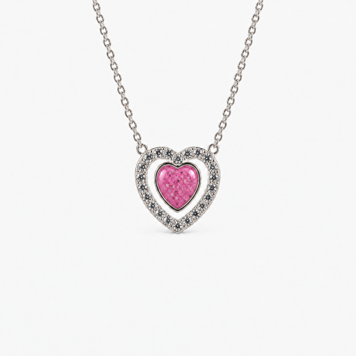 Heart Halo Ashes Necklace in Pink with visible inclusions