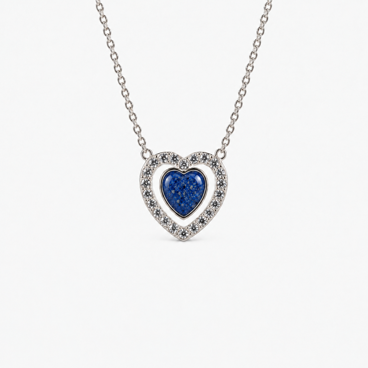 Heart Halo Ashes Necklace in Sapphire with visible inclusions