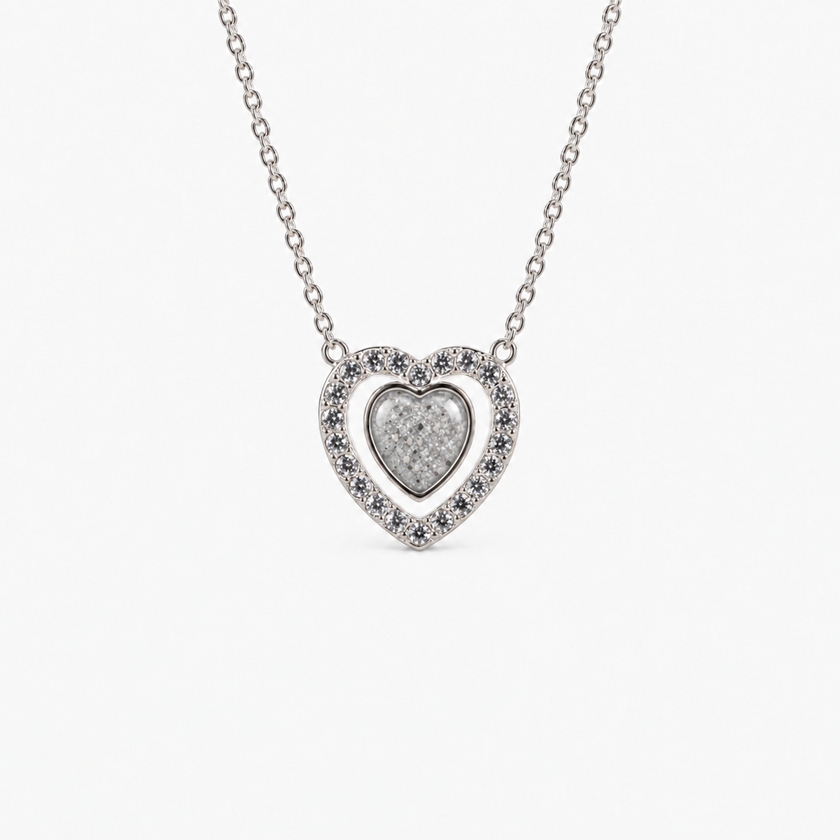 Heart Halo Ashes Necklace in Silver with visible inclusions