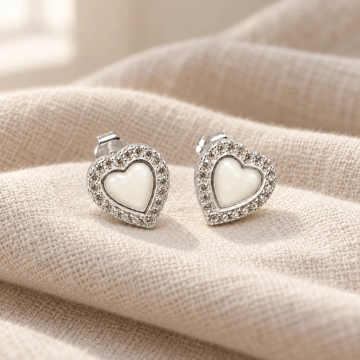 Heart Halo Breast Milk Earrings on pale linen — illustrative preview