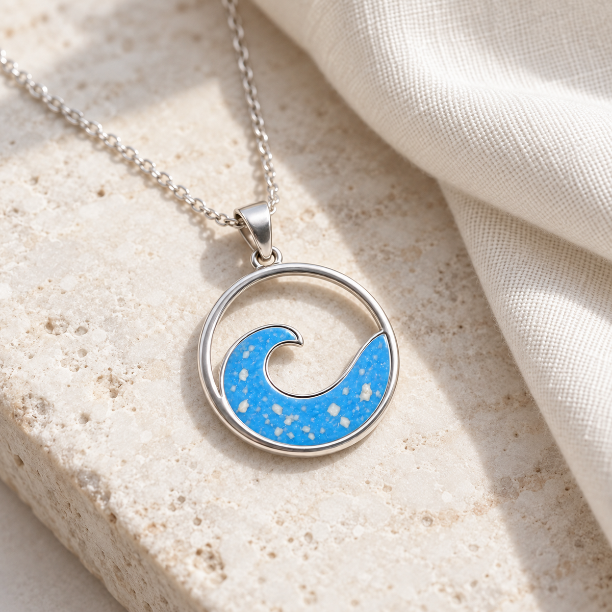Illustrative lifestyle view of Ocean Wave Ashes Necklace in Sky Blue