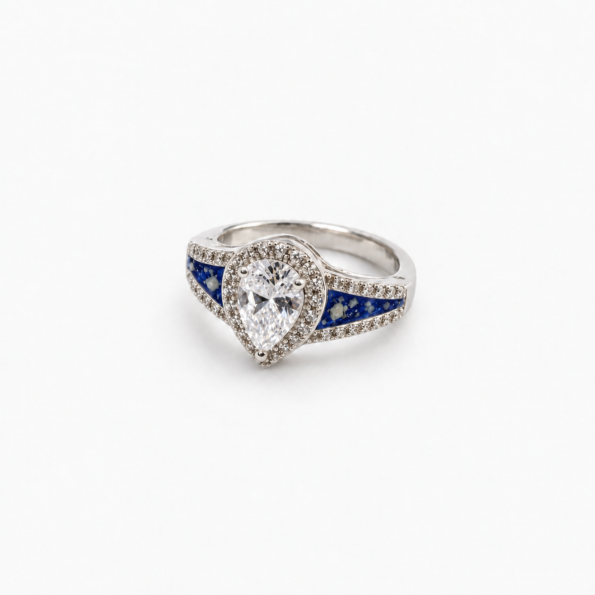 Pear CZ Ashes Ring in Sapphire with visible ashes