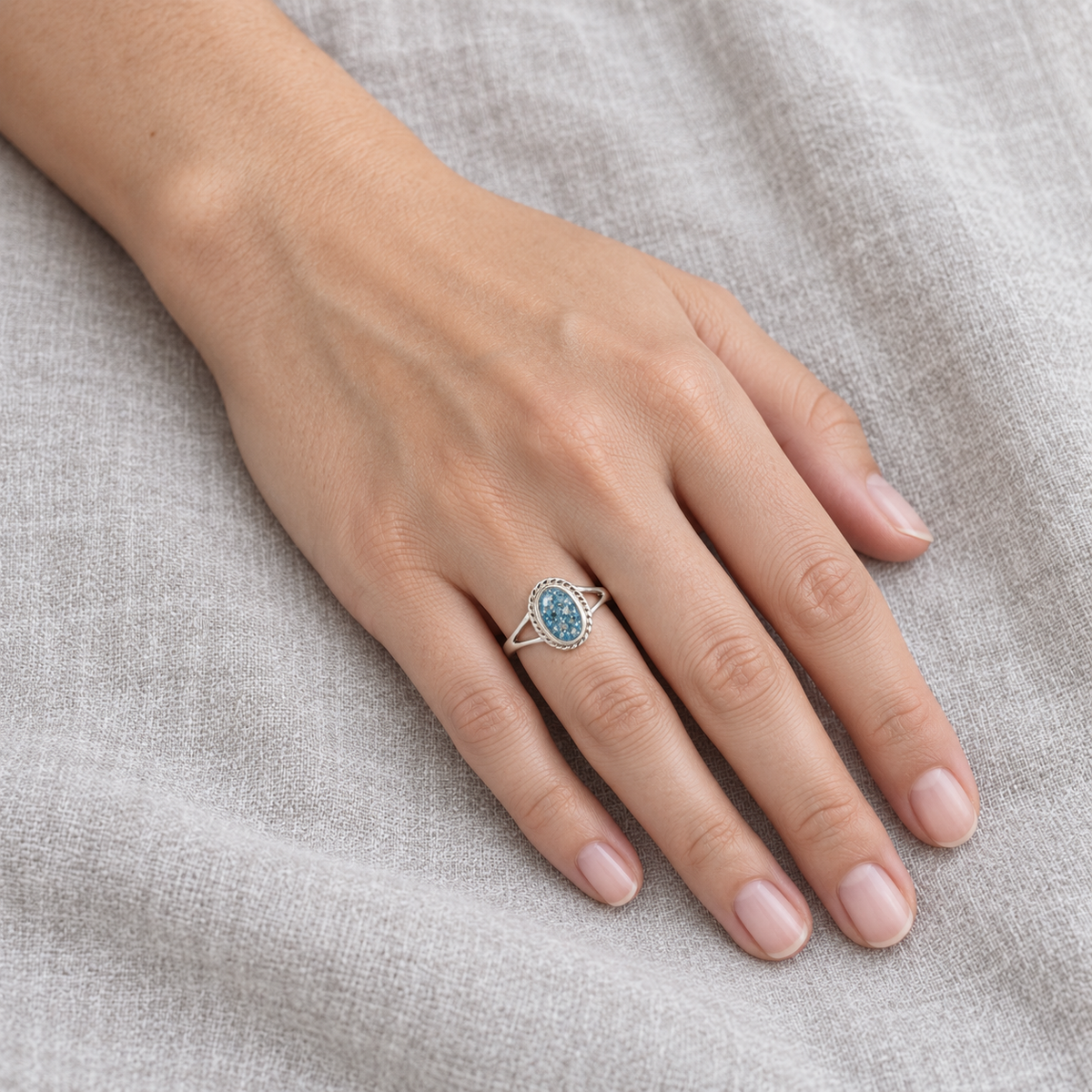 rope oval ashes ring in Sky Blue, shown at natural scale