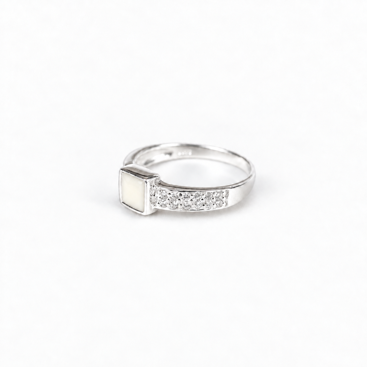 square crystal breast milk ring in 925 sterling silver with natural ivory resin