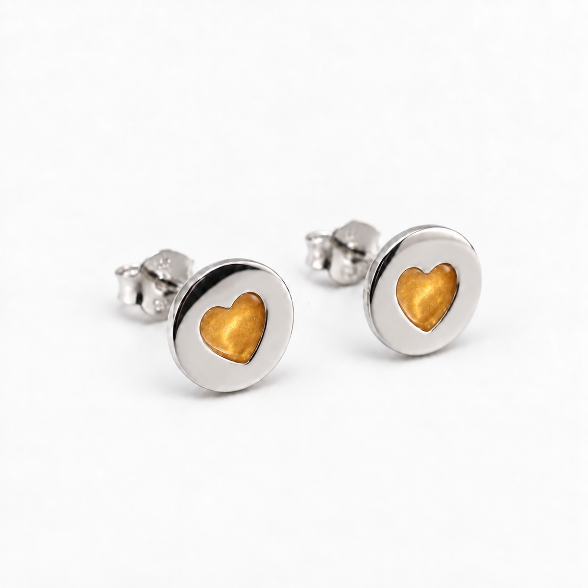 tiny heart disc ashes earrings — Amber, hidden ashes