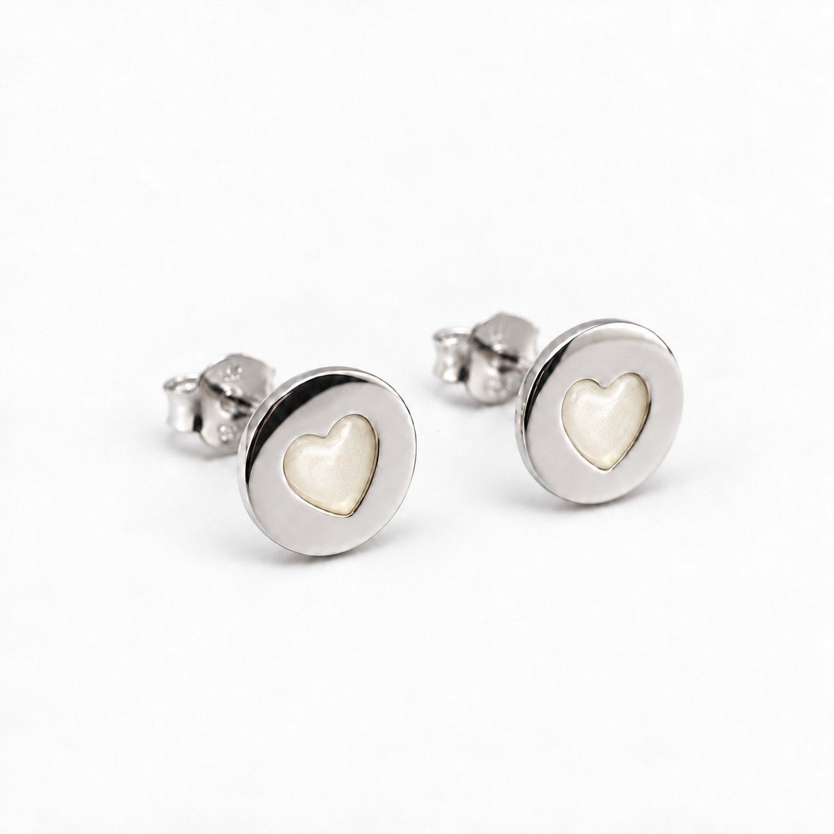 tiny heart disc ashes earrings — Pearl, hidden ashes