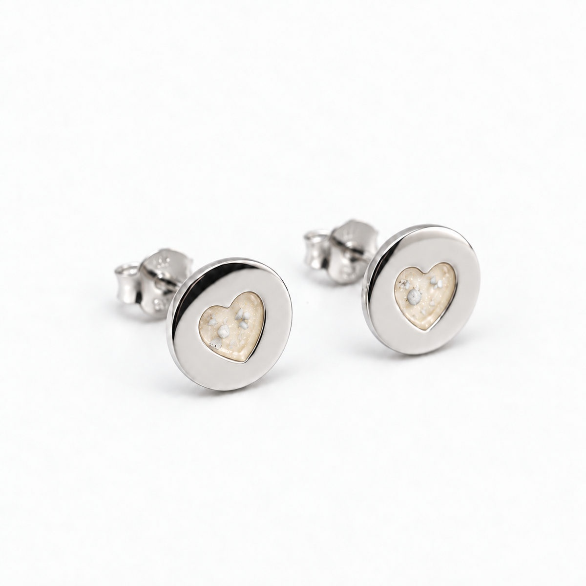 tiny heart disc ashes earrings — Pearl, visible ashes