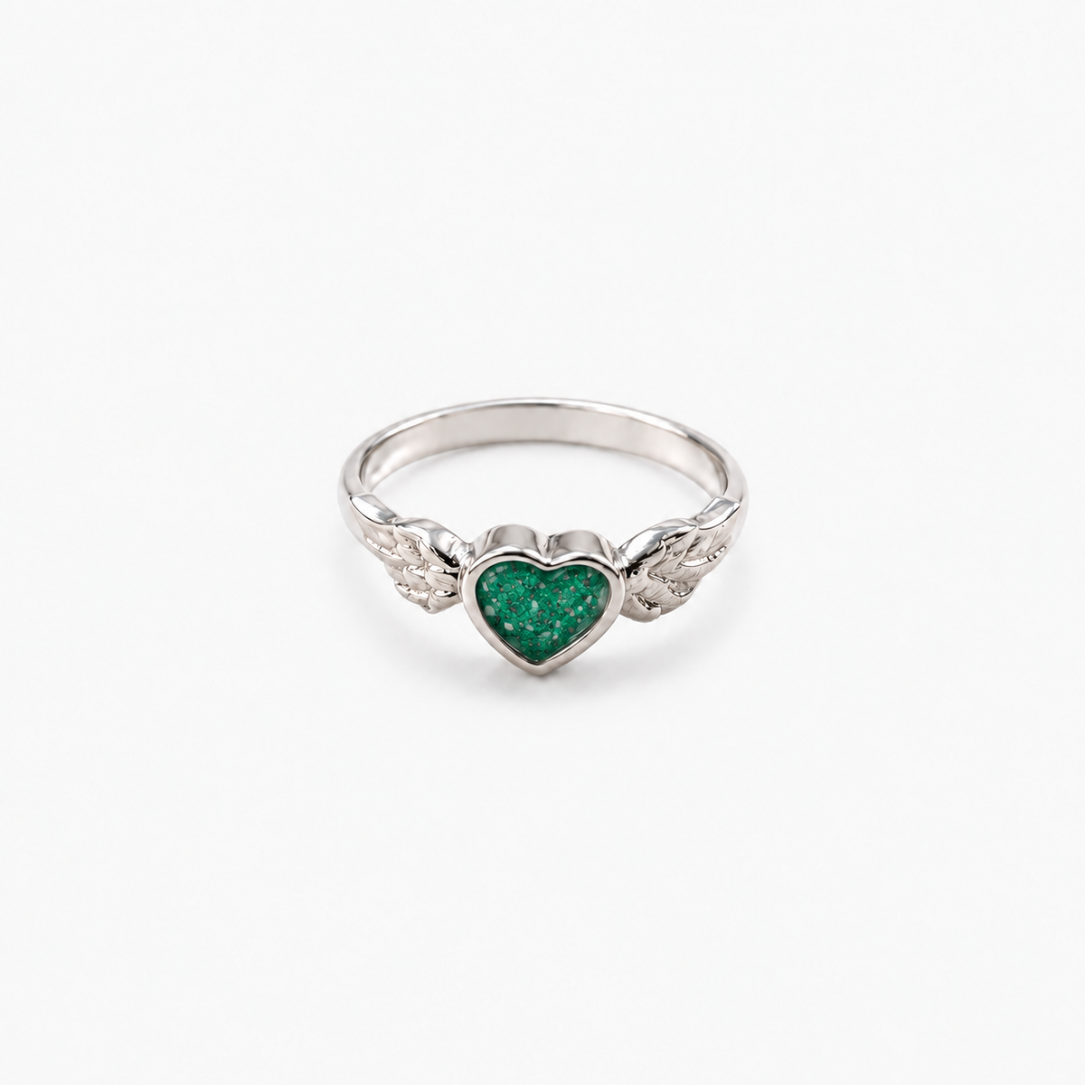 Winged Heart Ashes Ring — Emerald, visible ashes