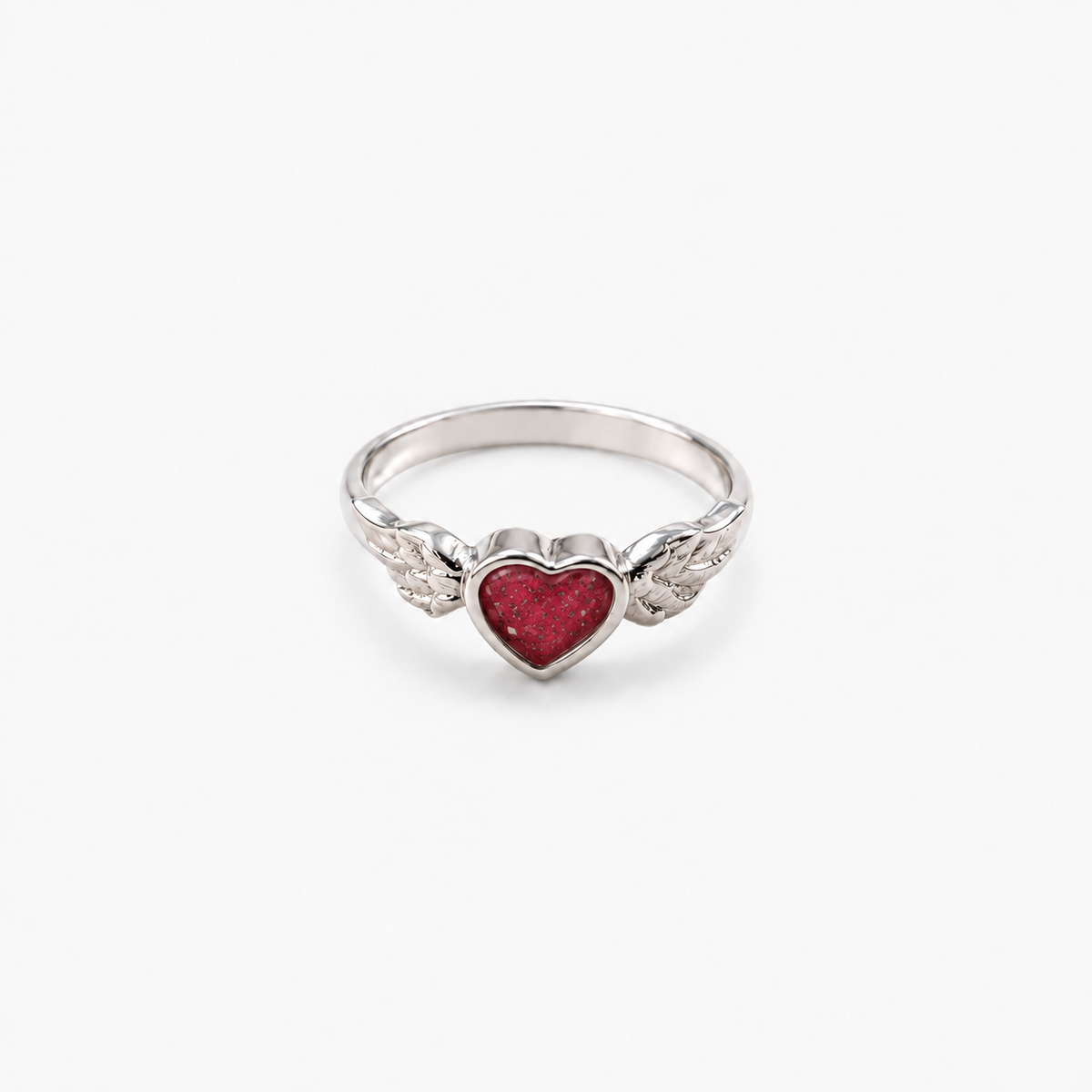 Winged Heart Ashes Ring — Ruby Red, visible ashes