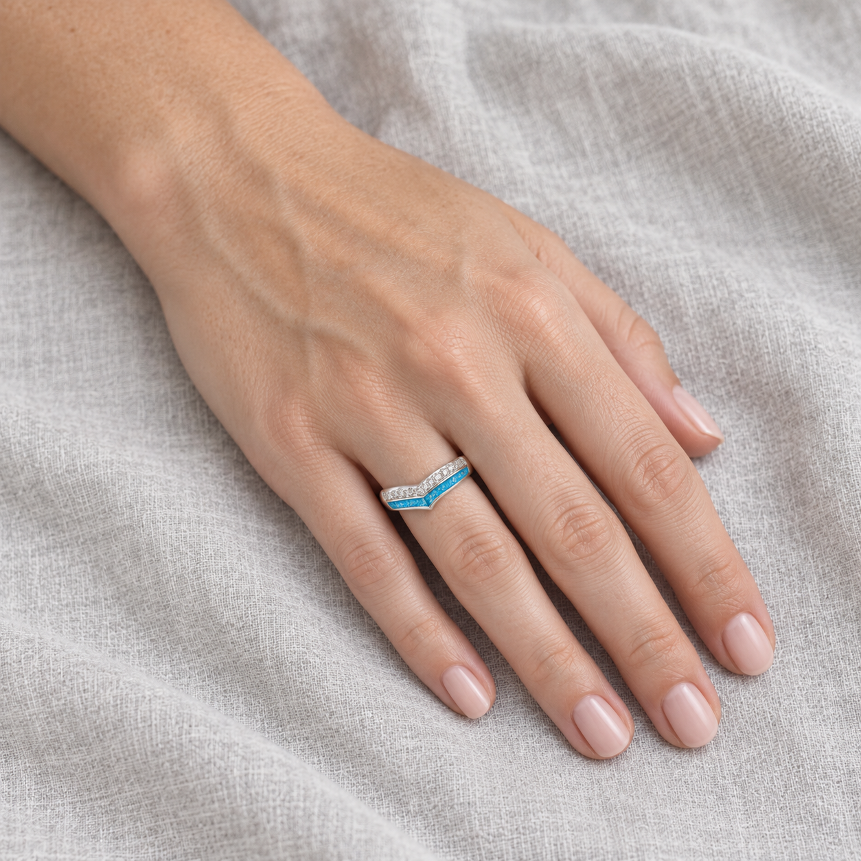 wishbone ashes ring in Sky Blue, shown at natural scale