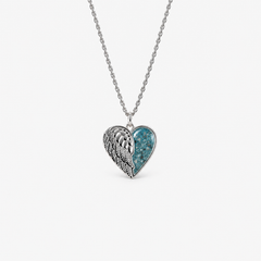 Angel Wing Heart Ashes Necklace — Sky Blue, visible ashes