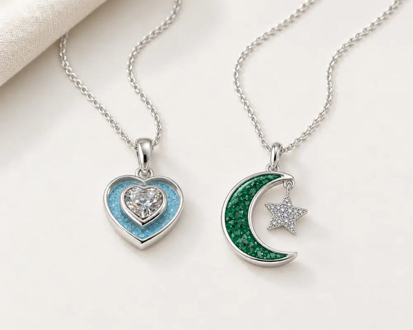 Crystal heart and moon-and-star memorial necklaces in sky blue and emerald