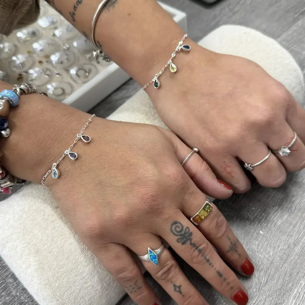 Personalised sterling silver permanent bracelets with birthstone charms