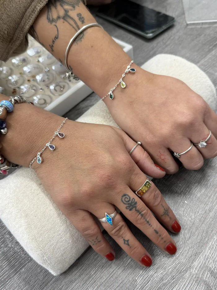 Personalised permanent bracelets with birthstone charms