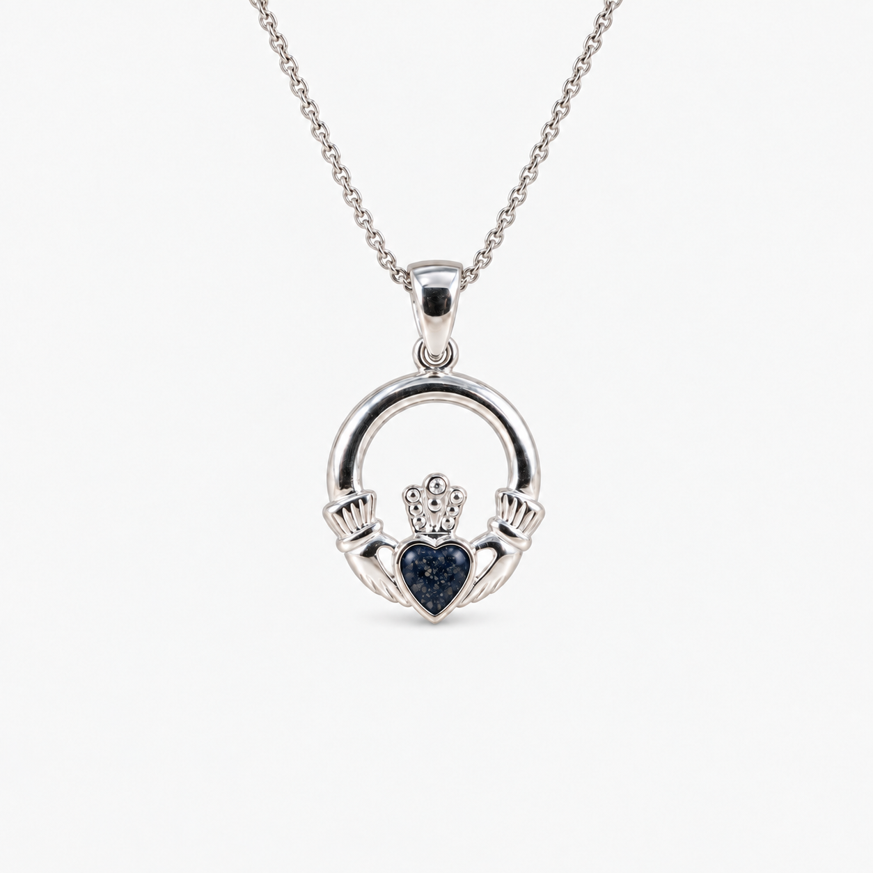 Claddagh Ashes Necklace in Midnight with visible inclusions