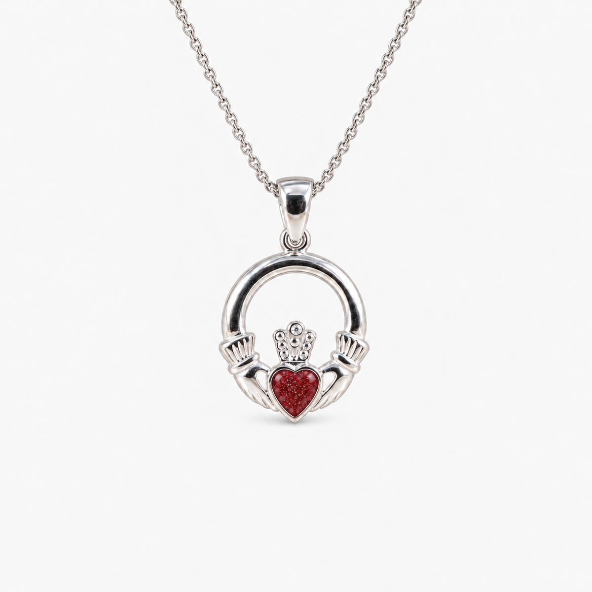 Claddagh Ashes Necklace in Ruby Red with visible inclusions