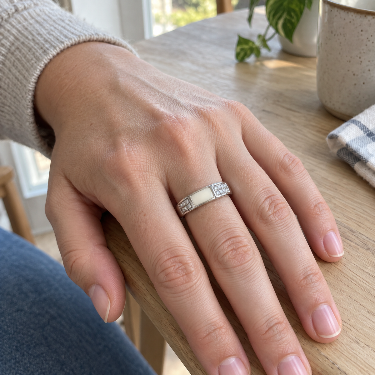 Illustrative worn view of crystal channel breast milk ring
