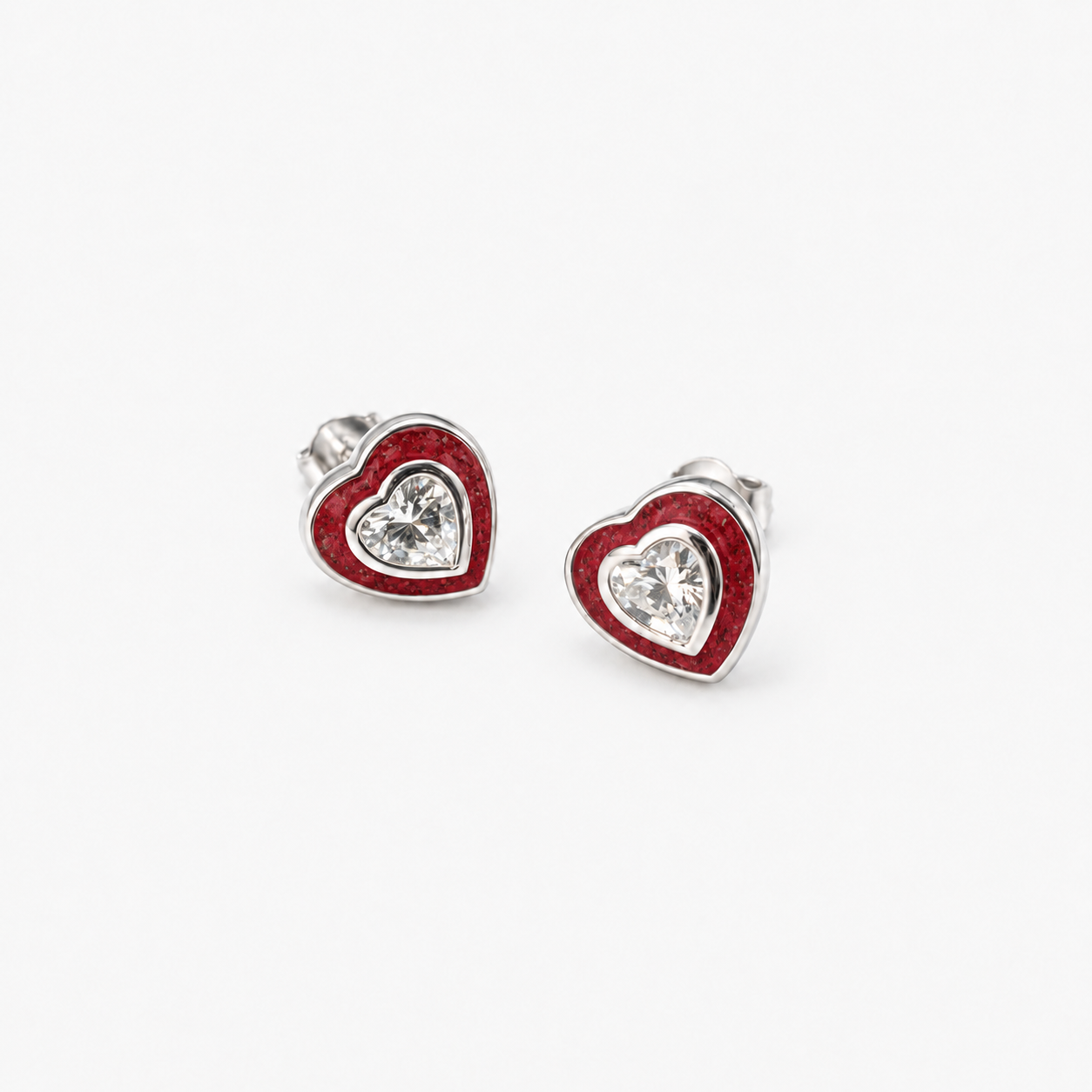 Crystal Heart Ashes Earrings — Ruby Red, visible ashes