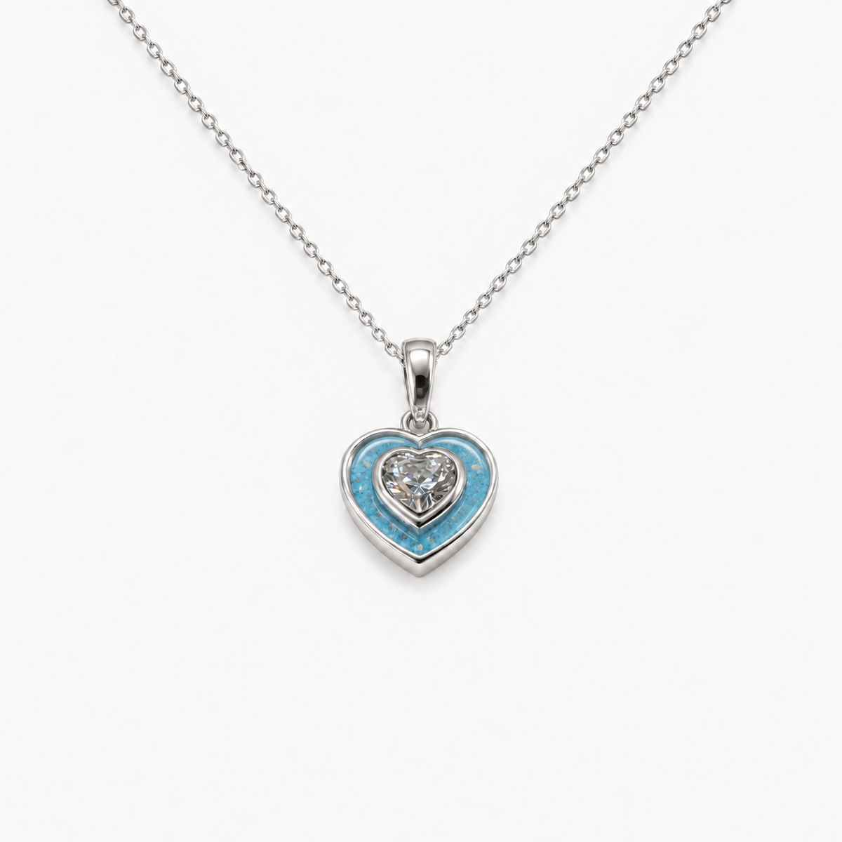Crystal Heart Ashes Necklace in Sky Blue with visible inclusions
