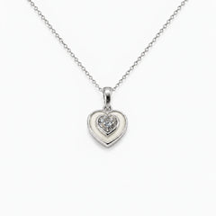 Crystal Heart Breast Milk Necklace in sterling silver with natural milk resin — illustrative preview
