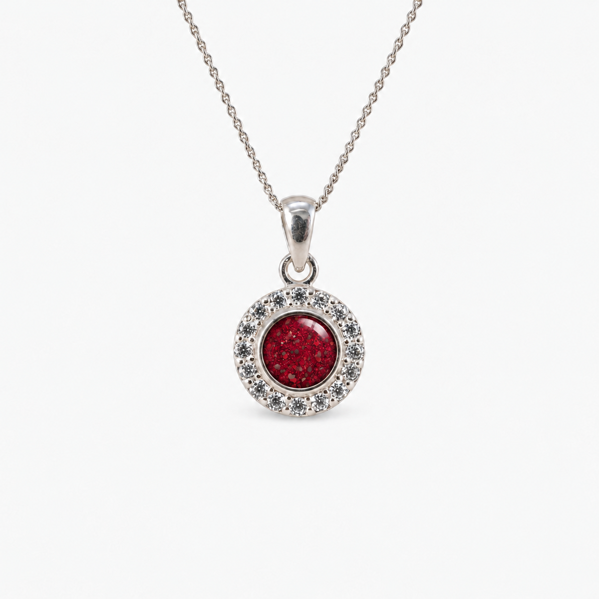Dainty Halo Ashes Necklace in Ruby Red with visible inclusions